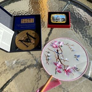 Three pieces from the Orient, a fan embroidered a painted momentum CD of China￼